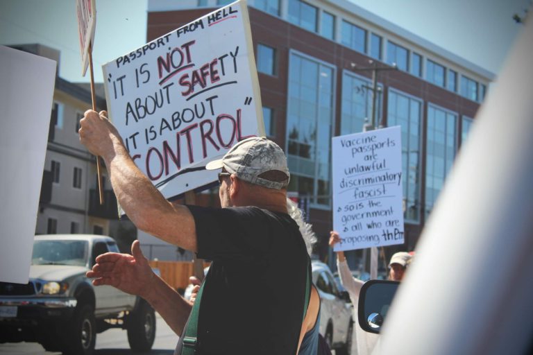 Vancouver Island healthcare worker spat at by anti-vaccine card protestor