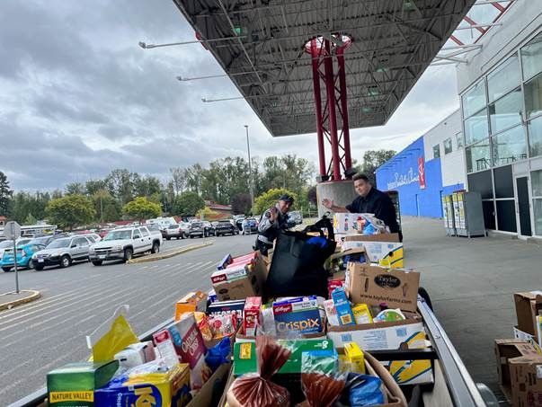 Generous supporters overflow canoe with donated food